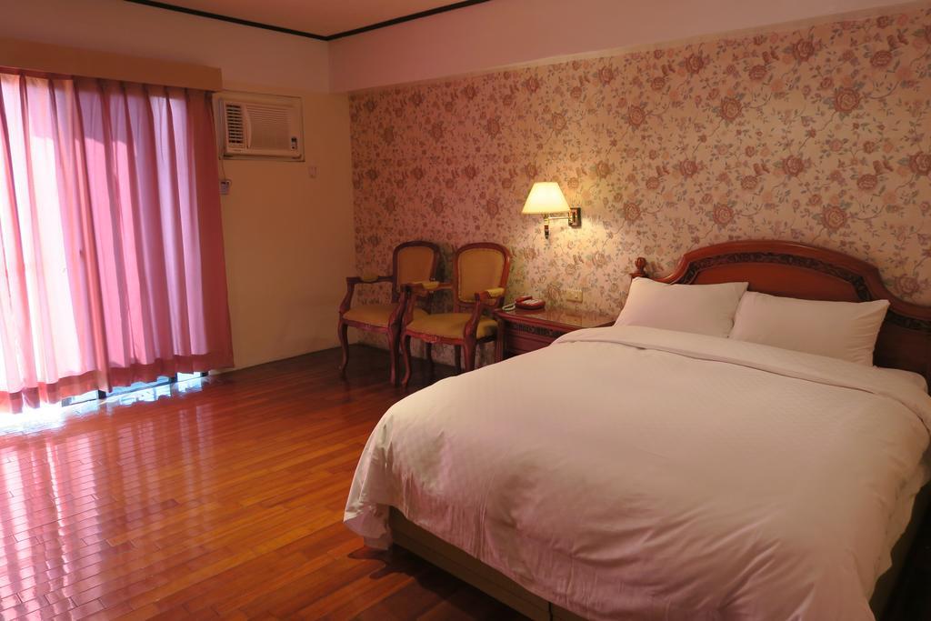 Champagne Hotel Jiaoxi Rom bilde